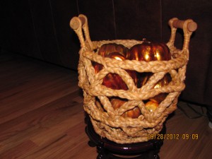 Put the basket on a wooden stand to elevate it on your table to create different heights.